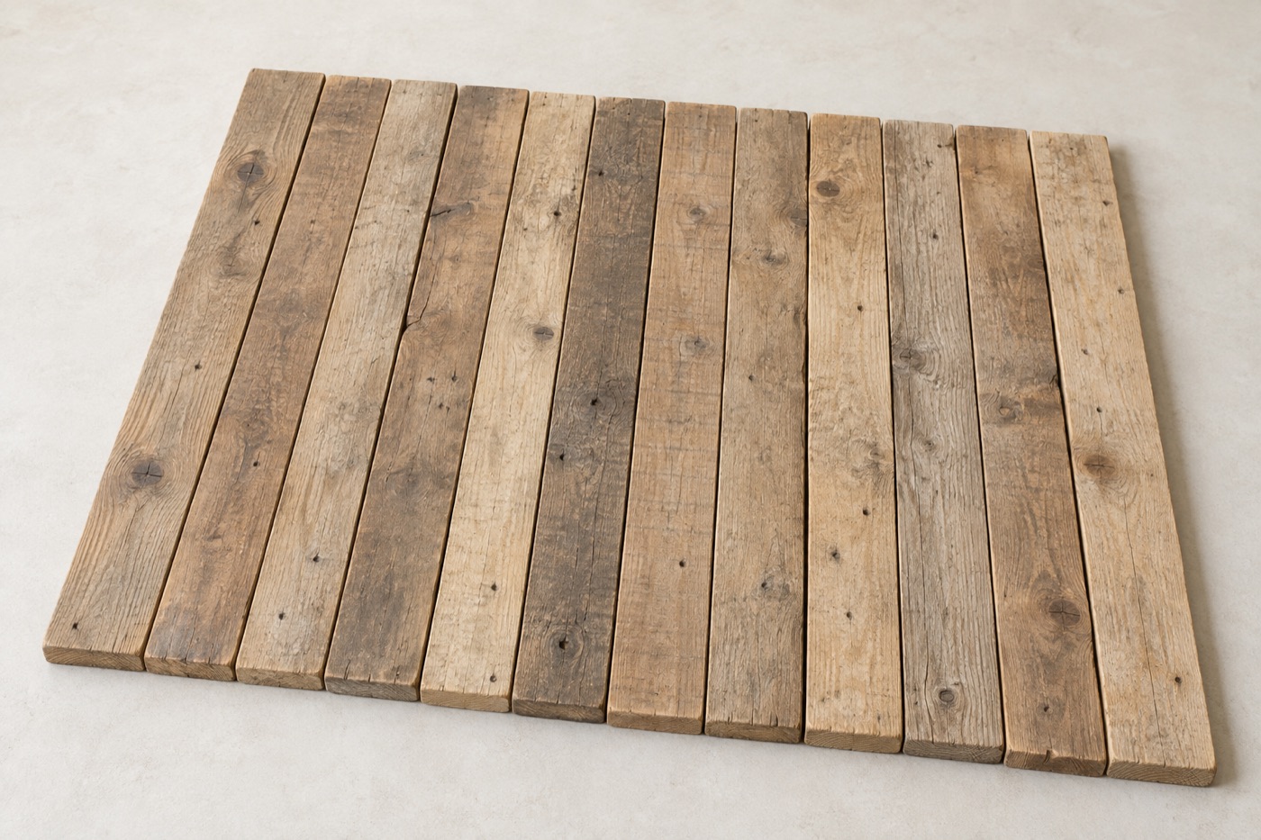 Treated timber boards with a pale green tint and clean planed surface